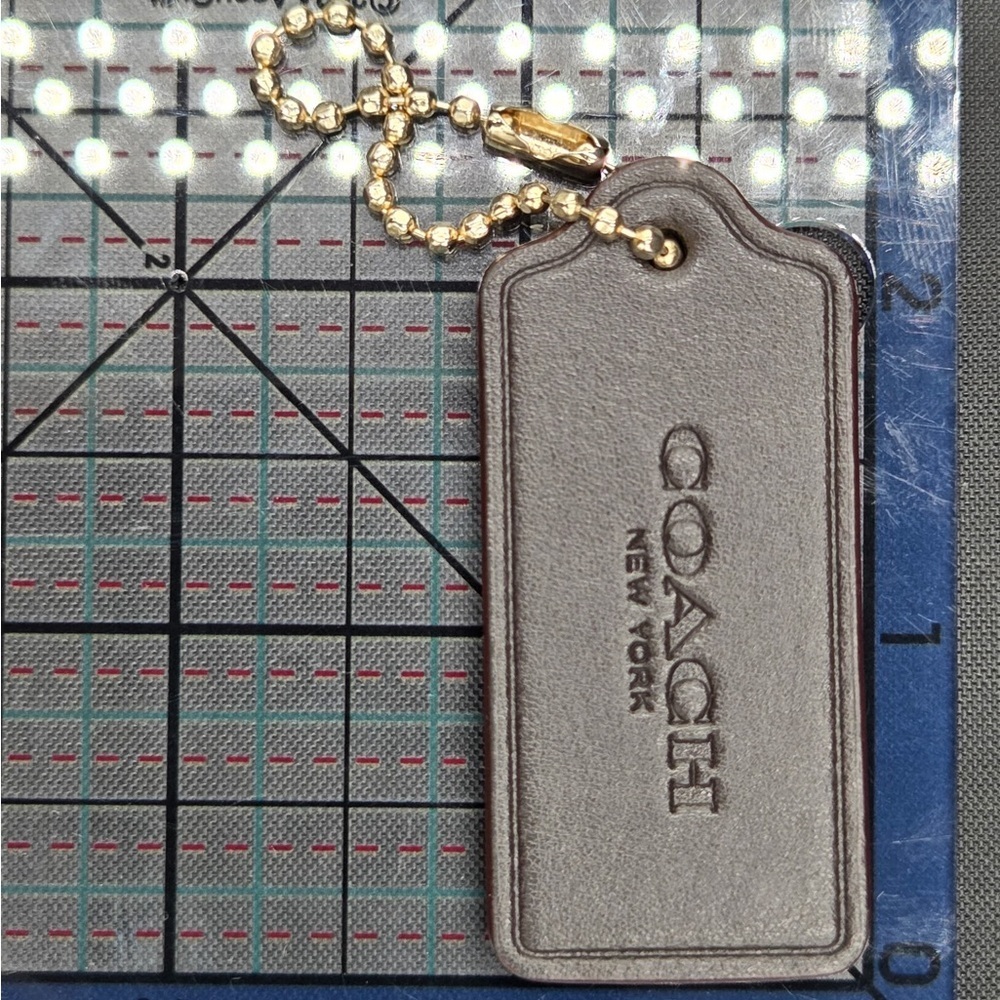 Coach Silver Leather Tag